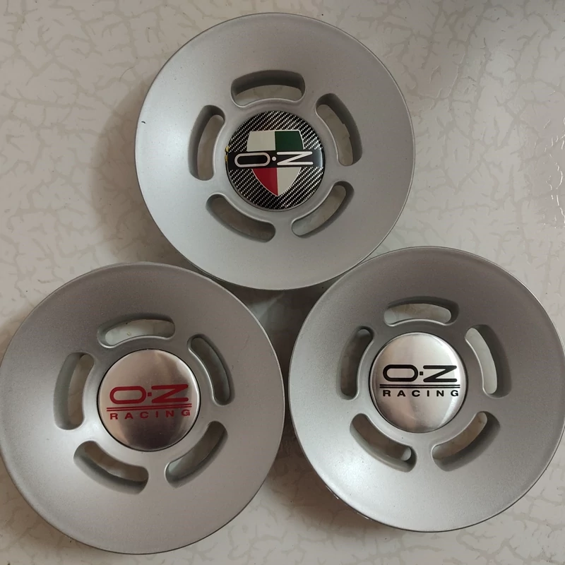 بچه قالپاق oz کاپ تورینگی چرخ ماشین اسپرت برند اوزد مارک لوگو او زد O.z racing درپوش خرچ خودرو