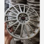 قالپاق طرح رینگ اوزد ساینا و کوییک سایز رینگ و لاستیک فابریک چرخ ماشین 14 اینچ مدل oz