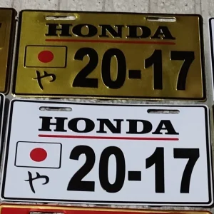 پلاک موتور سیکلت پاکشتی هوندا لوگو برجسته honda در دو رنگ طلایی و سفید پلاک موتور سیکلت پا کشتی گرینو دیو جوکر اسکوپی