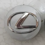 کاپ رینگ لکسوس نقره ای رنگ قاب درپوش تورینگی وسط چرخ لاستیکی لکسوز سایز فابریک مدل ls460 rx350 nx300 es350 is300 ct200