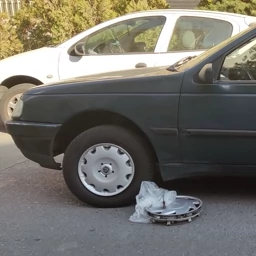 قالپاق اسپرت آردی سایز 13 اینچ پژو RD با دوررینگ پیکان