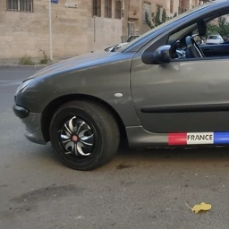 قالپاق اسپرت 206 پژویی مدل رینگی سایز رینگ لاستیک فابریک 14 اینچ پژو رنگ استیل مشکی اسپورت پژو206 طرح آرسی rc