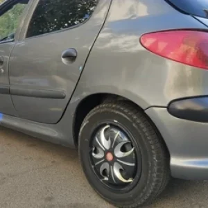 قالپاق اسپرت 206 پژویی مدل رینگی سایز رینگ لاستیک فابریک 14 اینچ پژو رنگ استیل مشکی اسپورت پژو206 طرح آرسی rc